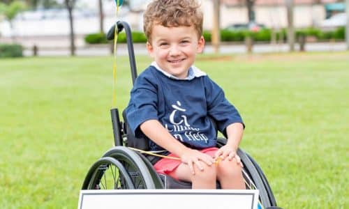 young boy in a wheelchair
