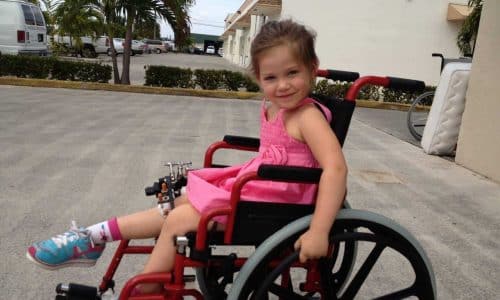 young girl in wheelchair